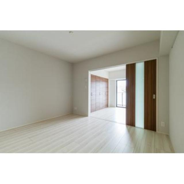 ※写真は同タイプ住戸です。(居間)