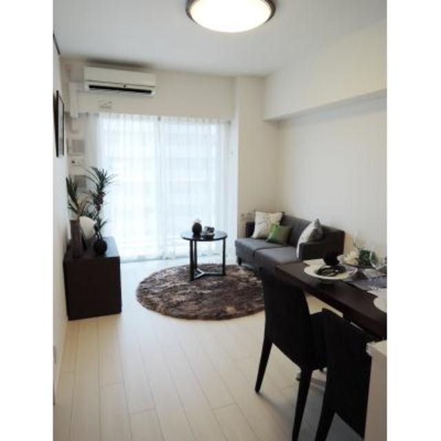 ※写真は同タイプ住戸です。(居間)