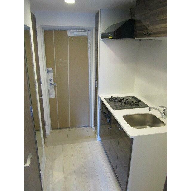 大型レンジフード付きキッチン(キッチン)