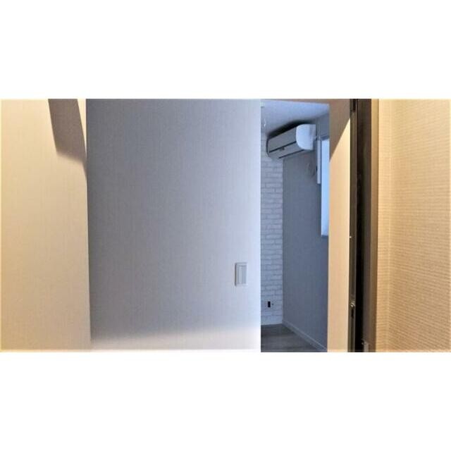 ホワイトオーク系の建具を使用した落ち着きのある室内(玄関)